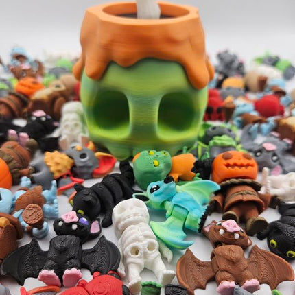 Halloween Pocket Pet Pack with 3D Printed Skull Container & 10 Random Halloween Themed Mini Pets for Desk Toys Party Favors and Classroom Gifts - Vampire
